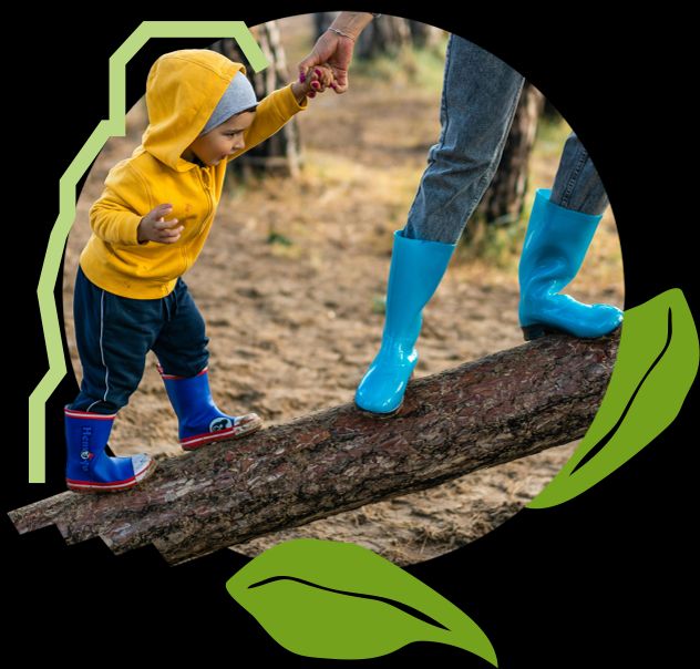 Child balancing on log