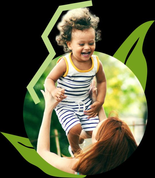 A foster carer holding a child reading